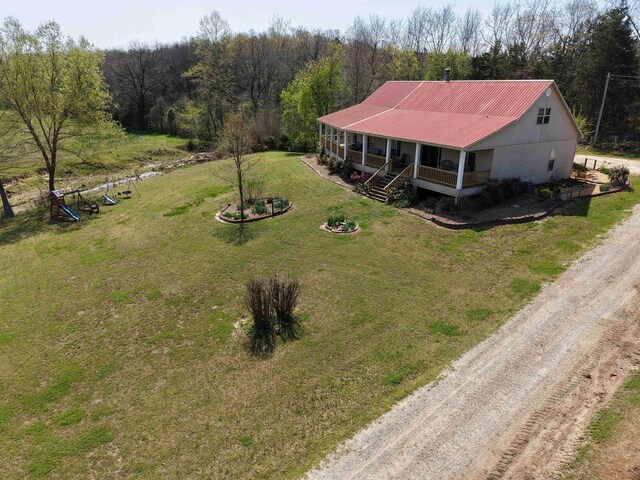 2157 Pleasant Grove Rd, Wideman, AR 72585 - bird's eye view featuring a wooded view