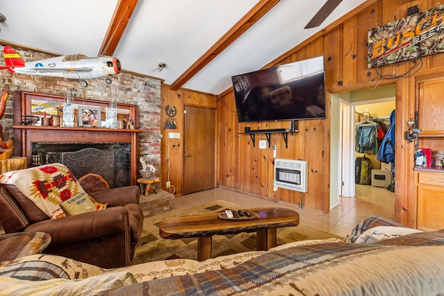 138 Ridge Rd, Houston, AR 72070 - living area with a fireplace, heating unit, vaulted ceiling with beams, tile patterned floors, and wood walls