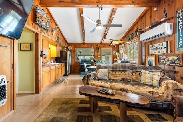 138 Ridge Rd, Houston, AR 72070 - living area with a wall unit AC, wood walls, lofted ceiling with beams, light tile patterned flooring, and a ceiling fan