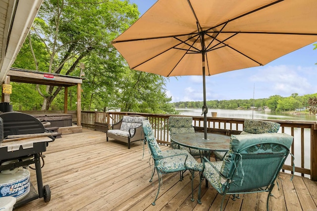 138 Ridge Rd, Houston, AR 72070 - wooden terrace featuring outdoor dining space, a water view, and a hot tub