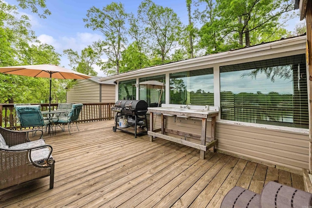 138 Ridge Rd, Houston, AR 72070 - wooden terrace featuring outdoor dining space and a grill