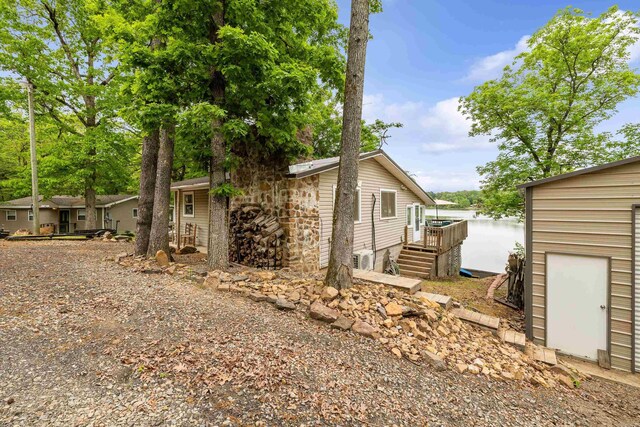 138 Ridge Rd, Houston, AR 72070 - view of side of property featuring a deck with water view