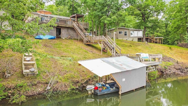 138 Ridge Rd, Houston, AR 72070 - dock area featuring a deck with water view, stairway, and a yard