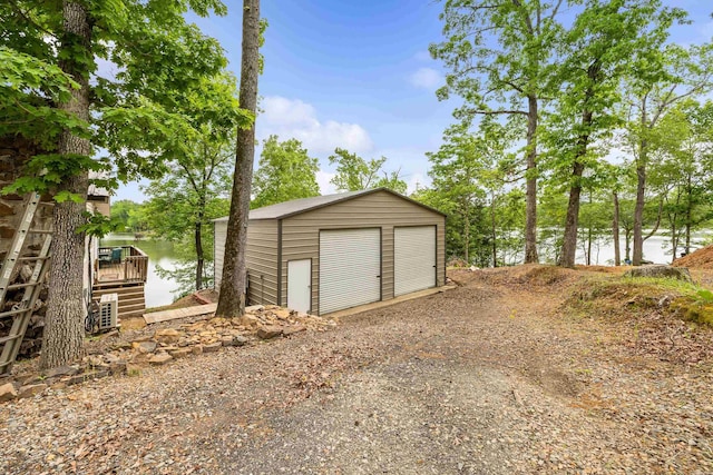 138 Ridge Rd, Houston, AR 72070 - detached garage featuring a water view
