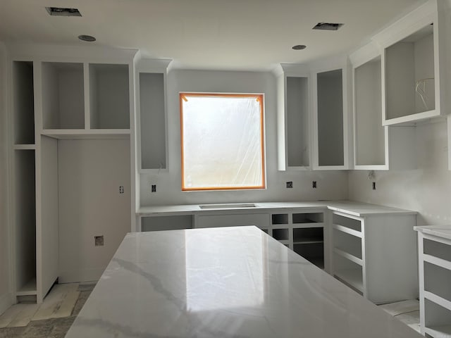 3516 Logan Rdg, Bryant, AR 72022 - kitchen featuring visible vents and light stone countertops