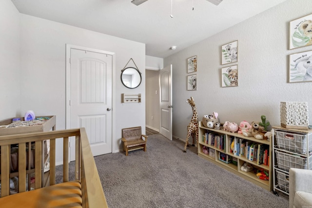 carpeted bedroom featuring a ceiling fan