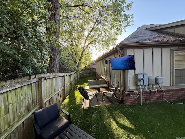 view of yard with a fenced backyard