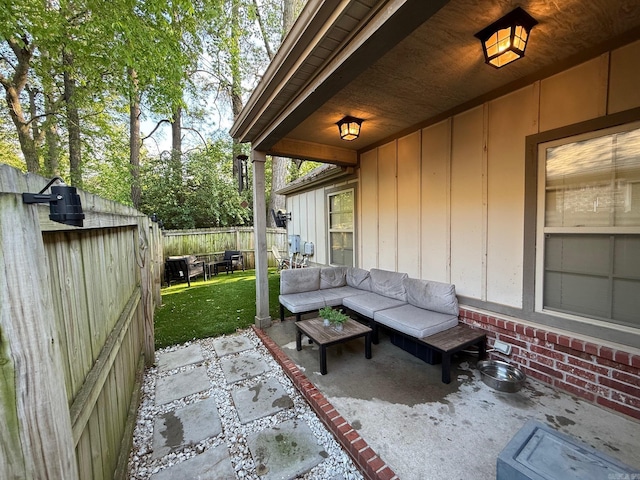 view of patio / terrace featuring an outdoor living space and a fenced backyard