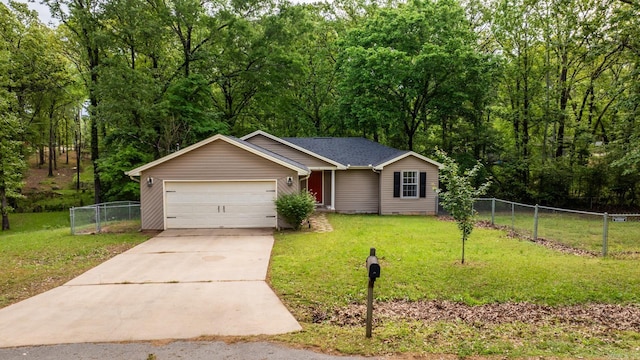 ranch-style home featuring fence, driveway, a front yard, and an attached garage