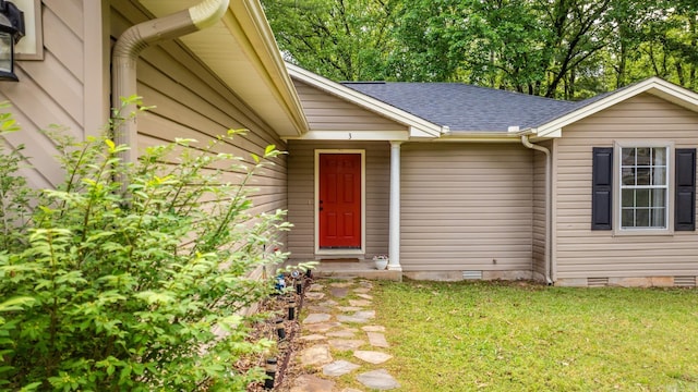 property entrance featuring a yard, crawl space, and roof with shingles