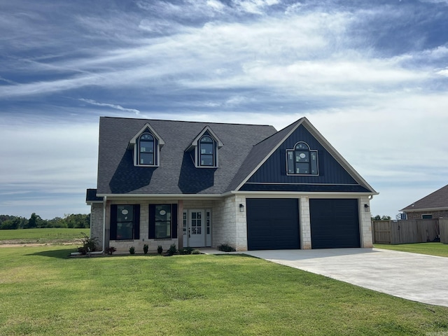 4406 Magee Dr, Texarkana, AR 71854 - view of front of house with fence, stone siding, a front lawn, concrete driveway, and an attached garage
