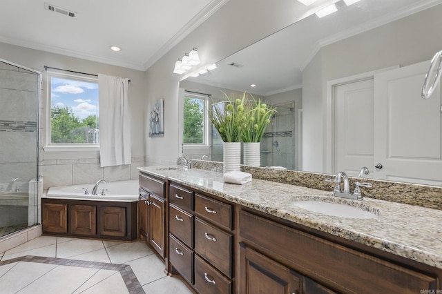 full bathroom featuring a sink, tile patterned floors, a stall shower, visible vents, and ornamental molding