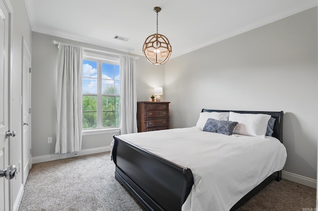 carpeted bedroom featuring ornamental molding, visible vents, and baseboards