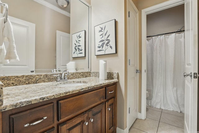 bathroom with vanity, toilet, ornamental molding, tile patterned flooring, and a shower with shower curtain