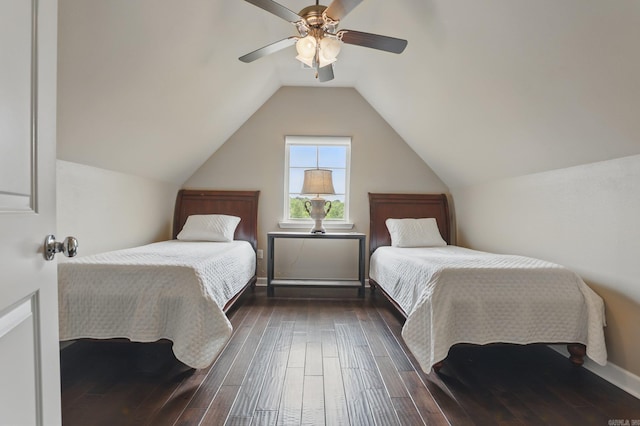 bedroom featuring dark wood-style floors, ceiling fan, and vaulted ceiling