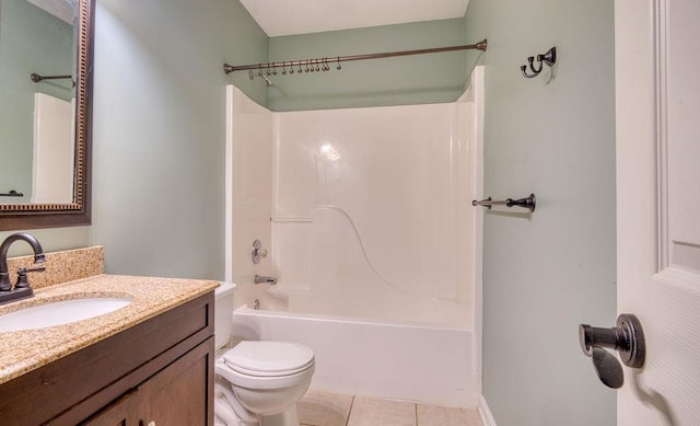 bathroom featuring toilet, tile patterned flooring, vanity, and shower / bathing tub combination