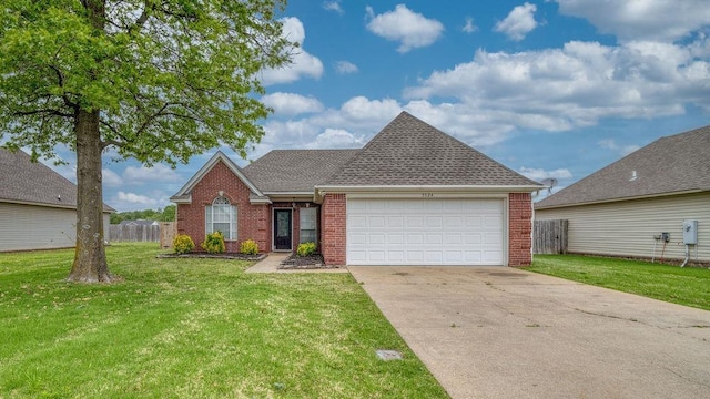 view of front facade with a front lawn, a garage, brick siding, concrete driveway, and fence