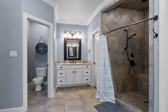 full bathroom featuring a tile shower, ornamental molding, toilet, vanity, and baseboards