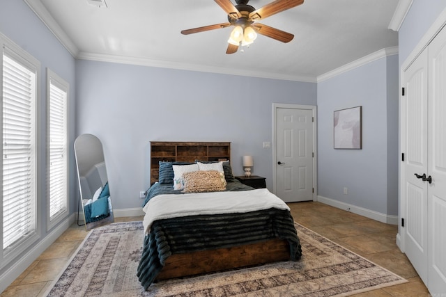 bedroom with baseboards, stone finish flooring, a ceiling fan, and crown molding