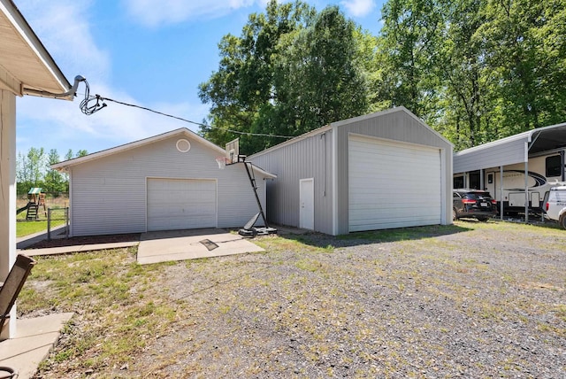 detached garage with fence