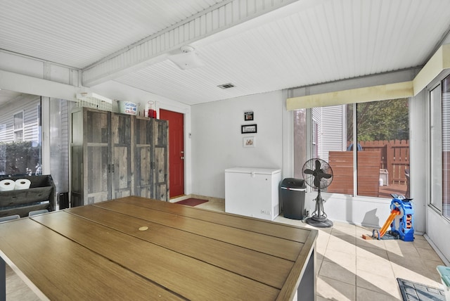 dining space with visible vents, plenty of natural light, and tile patterned flooring