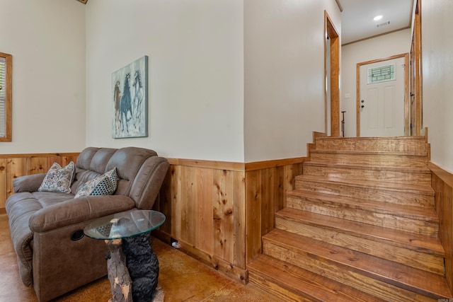 539 Burchwood Bay Rd, Hot Springs, AR 71913 - staircase featuring wooden walls and a wainscoted wall