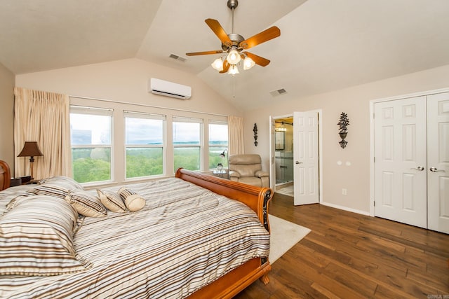 bedroom featuring wood finished floors, visible vents, a wall mounted AC, and lofted ceiling
