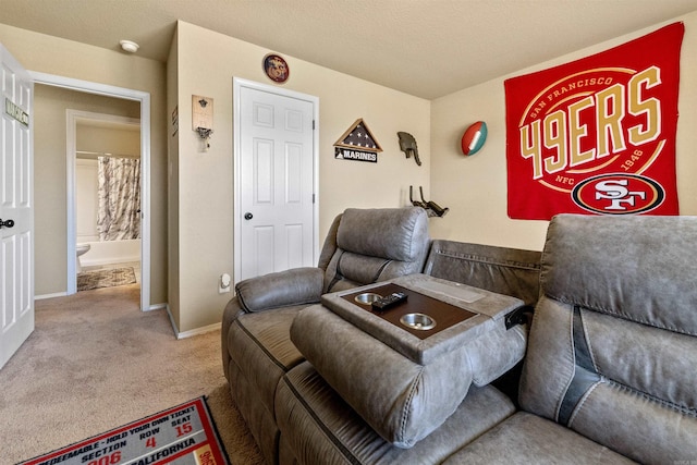 living room with carpet flooring and baseboards