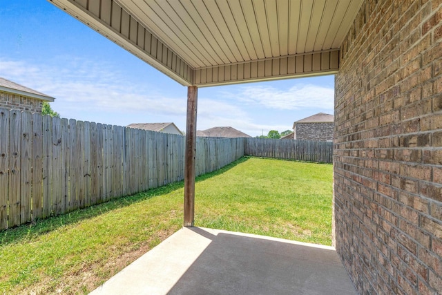 view of yard featuring a fenced backyard and a patio area