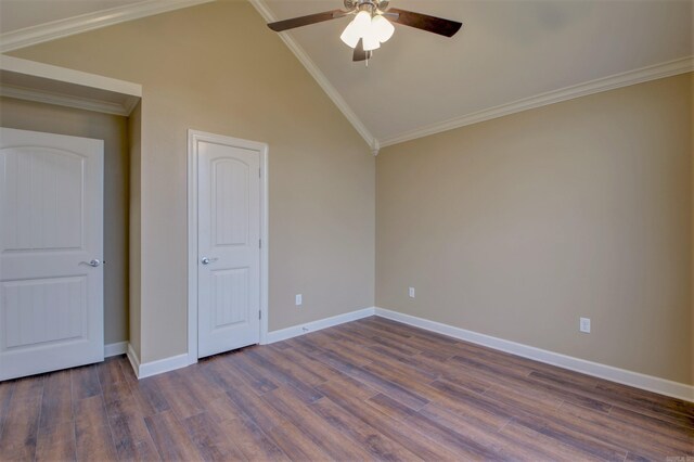unfurnished bedroom featuring baseboards, wood finished floors, and lofted ceiling