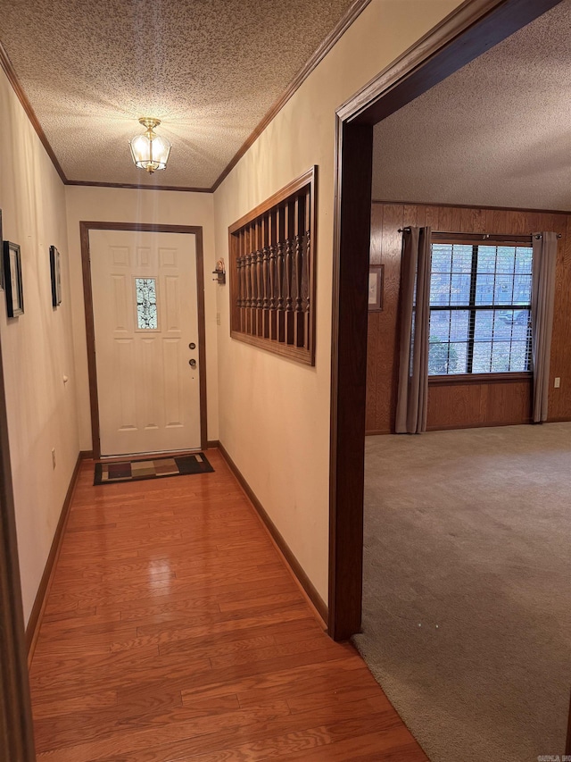 1721 Azalea Hills Rd, White Hall, AR 71602 - hallway with a textured ceiling, crown molding, wood finished floors, baseboards, and a chandelier