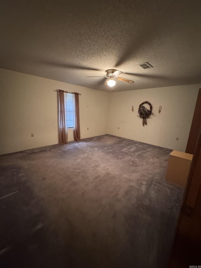 1721 Azalea Hills Rd, White Hall, AR 71602 - unfurnished room featuring ceiling fan, a textured ceiling, and dark carpet