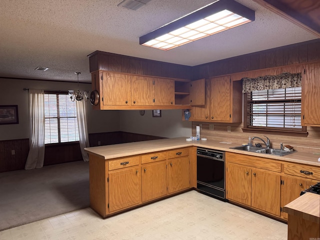 1721 Azalea Hills Rd, White Hall, AR 71602 - kitchen with dishwasher, a sink, a textured ceiling, a chandelier, and light countertops