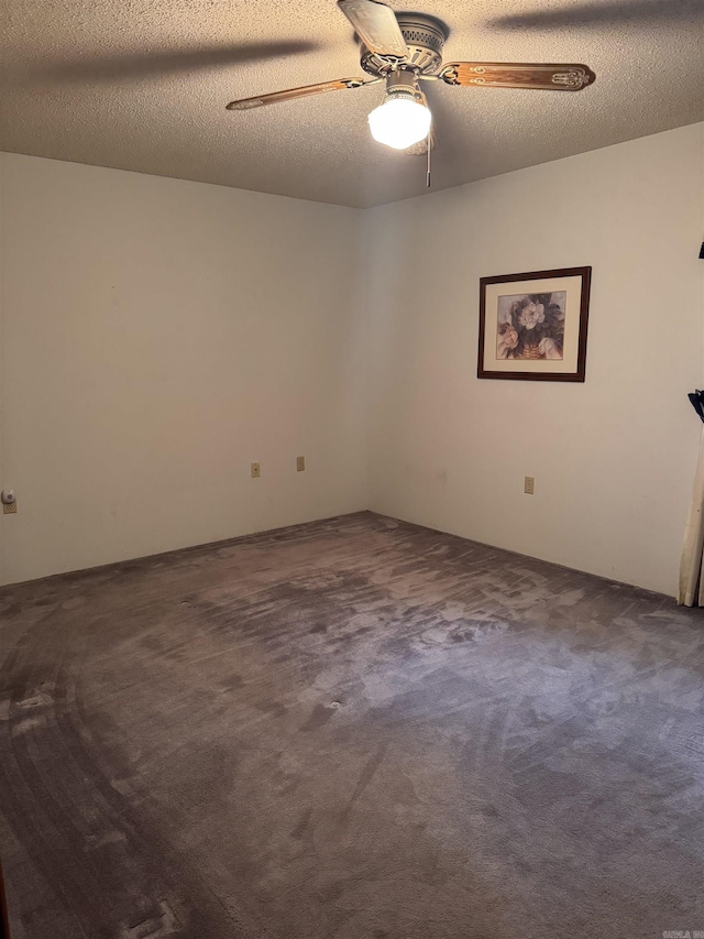 1721 Azalea Hills Rd, White Hall, AR 71602 - empty room featuring dark colored carpet and a ceiling fan