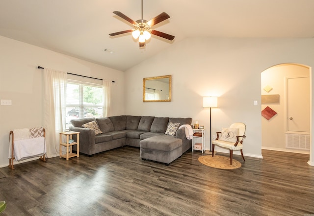 living room with a ceiling fan, baseboards, arched walkways, lofted ceiling, and dark wood finished floors