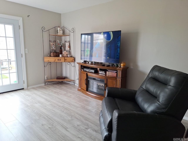 135 Hillview Dr Unit 109, Fairfield Bay, AR 72088 - living room with light wood-style floors and baseboards