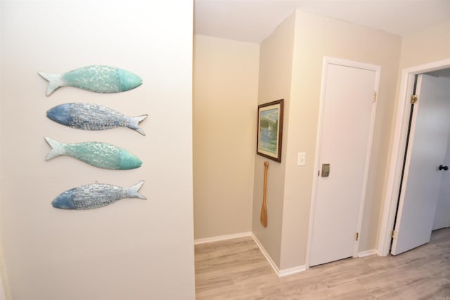 135 Hillview Dr Unit 109, Fairfield Bay, AR 72088 - corridor featuring baseboards and light wood-type flooring