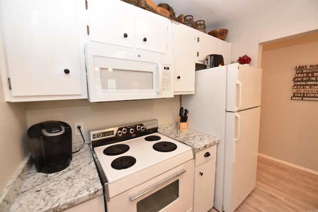 135 Hillview Dr Unit 109, Fairfield Bay, AR 72088 - kitchen featuring light wood finished floors, white appliances, and white cabinets