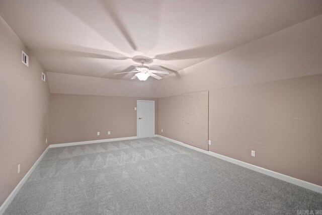 2360 Lakeshore Ln, Cabot, AR 72023 - bonus room featuring lofted ceiling, ceiling fan, visible vents, baseboards, and light carpet