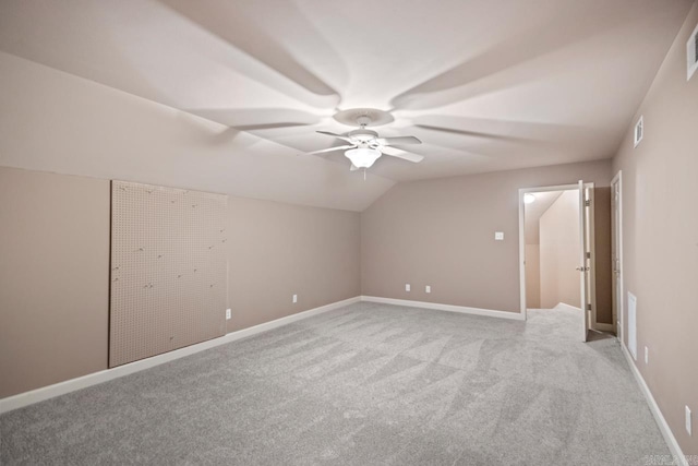 2360 Lakeshore Ln, Cabot, AR 72023 - additional living space with visible vents, light carpet, ceiling fan, and vaulted ceiling