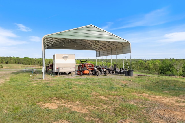 view of car parking featuring driveway and a detached carport