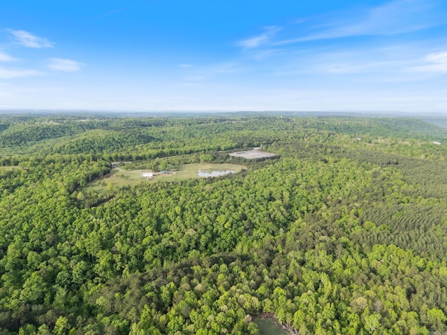 aerial view featuring a forest view