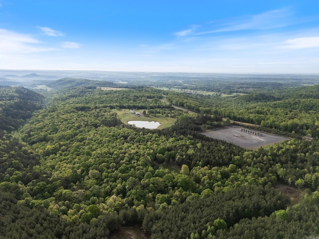 aerial view featuring a view of trees