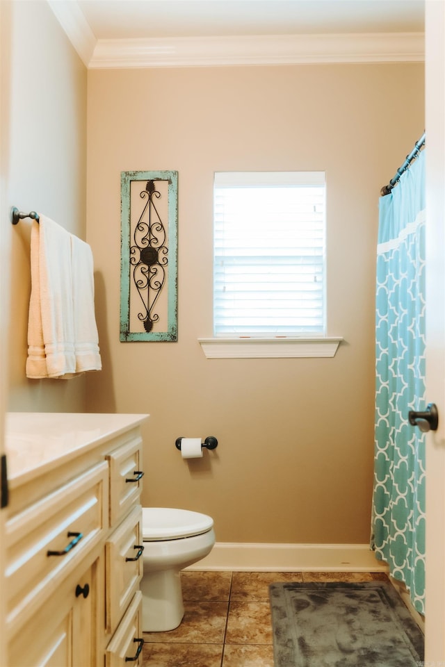 full bath featuring vanity, tile patterned floors, crown molding, toilet, and baseboards