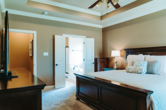 bedroom with a raised ceiling, ornamental molding, and light carpet