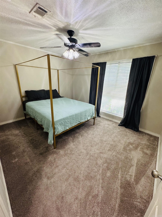 22 Azalea, Magnolia, AR 71753 - carpeted bedroom featuring baseboards, visible vents, a ceiling fan, and a textured ceiling