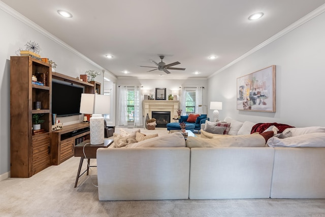 living room featuring crown molding, ceiling fan, light carpet, and recessed lighting
