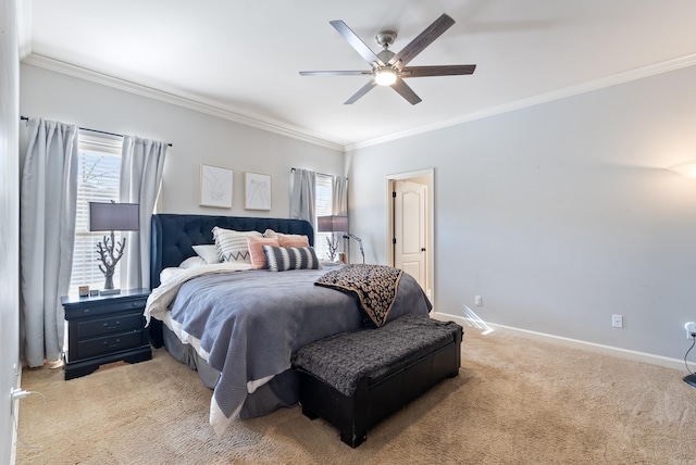 bedroom featuring crown molding, baseboards, multiple windows, and light carpet