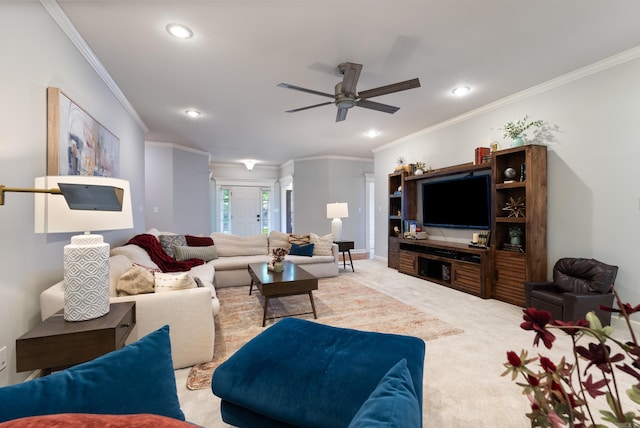 carpeted living area featuring crown molding, a ceiling fan, and recessed lighting