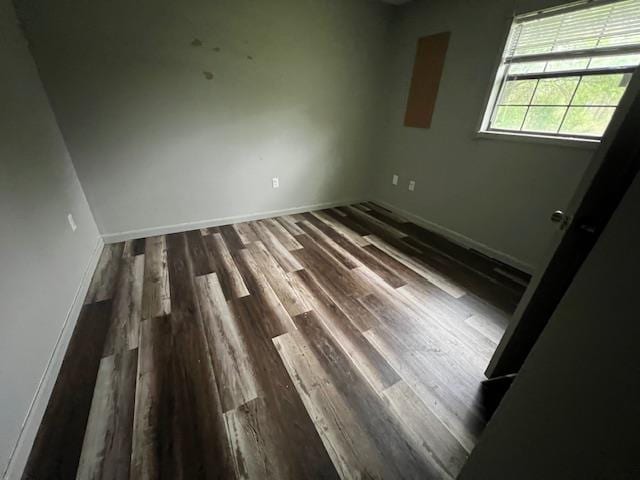 12326 Renshaw Ln, Trumann, AR 72401 - spare room with baseboards and wood finished floors
